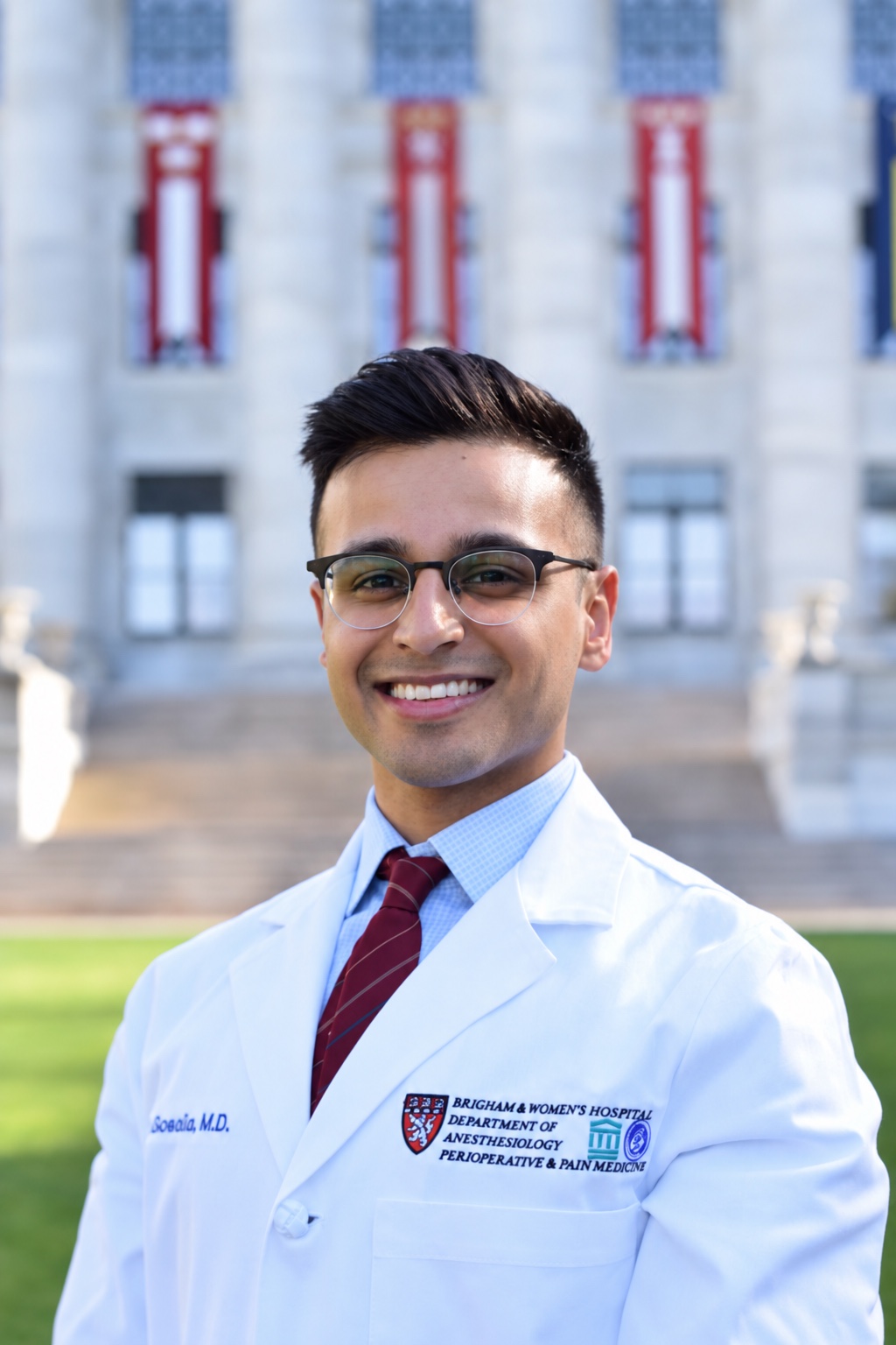 Dr. Nirmal Gosalia in a white coat